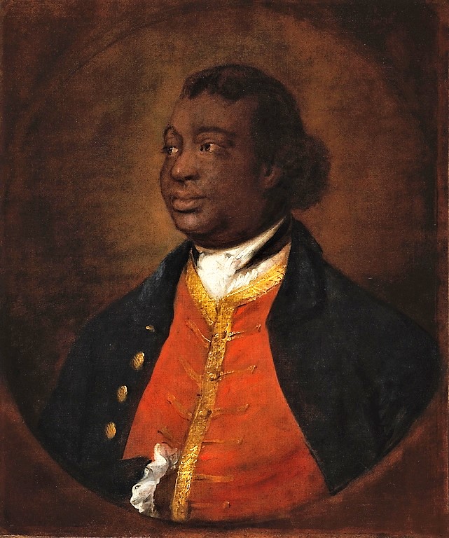 Oil painting of Ignatius Sancho looking to the side. He is wearing a red waistcoat with gold trim and a dark blue overcoat with gold buttons. Sancho is in front of a plan brown background.