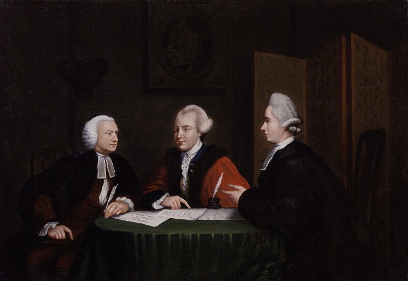 A painting of three white men sat around a table. The man on the left is in side profile, his right side is on show, he has a white wig on, he is wearing dark robes with white cuffs and neckerchief, his left hand is holding a quill and resting on the table, his left hand is resting on his leg. The man in the middle is faced slightly right of centre, he is wearing red robes and a white shirt, he has white receding hair, his right hand is resting on the table pointing at a document, there is a feather in a pot of ink in front of him. The man on the right has his left side in view and is looking at the man on the left of the image (opposite him), he is wearing a grey wig, dark robes and a white undershirt, his left hand is raised pointing across to the man opposite. On the table is a green covered cloth and three documents of paper with handwriting on them.