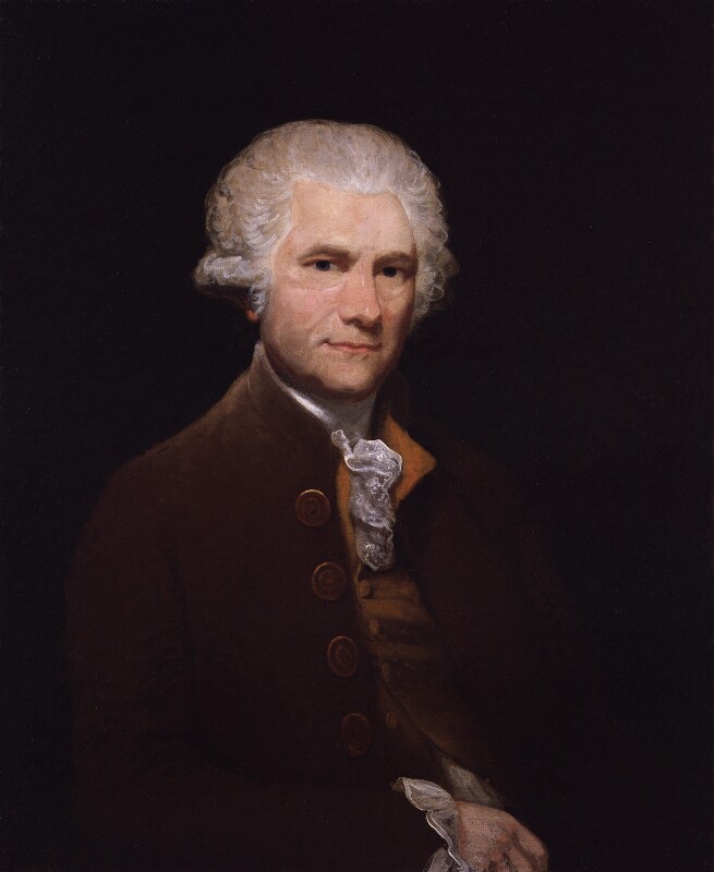 A painting of a white man. He has white hair. He is facing towards the artist and staring directly face on. His top half of his body and head are in the painting. He is wearing a dark red jacket, burnt orange waist coat and white neckerchief. His hands are on top of each other on his lap.