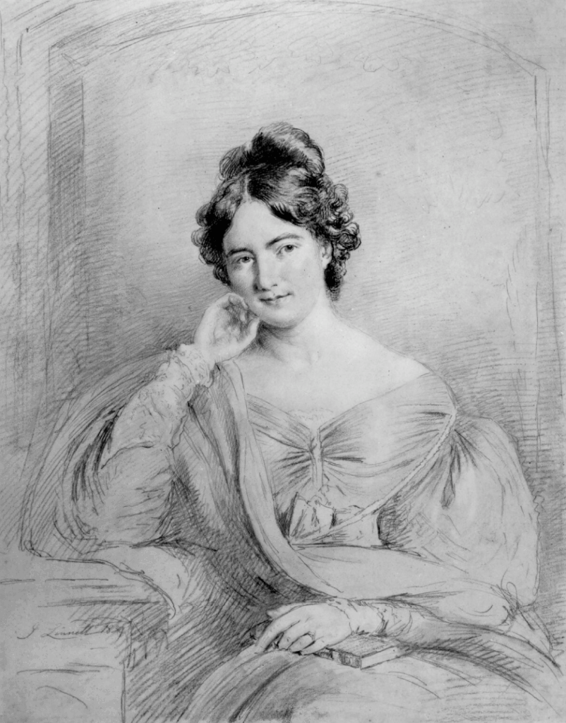 A black and white pencil sketch of Sarah Austin. Sitting down, she is wearing a billowy dress with long sleeves. In her left hand she is holding a book and her right hand is resting on a table and her hand is by her face. She has dark hair with her hair tied up.