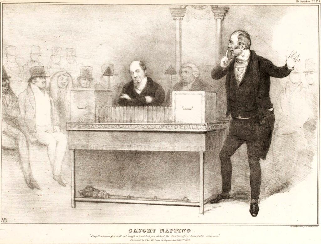 A black and white sketch of the Commons chamber titled 'caught napping'. To the right stands a man at the a table, with a black three piece suit with receding black hair with sideburns. He has a finger to his lips. In the middle of the sketch is the long table, with book across and two boxes either side, with the sceptre on the floor underneath the table. Behind the table Sits the chairman of the ways and means in a black suit with a bald head and black hair on the sides, who is asleep. The left of the picture shows the other side of the commons with men sitting on the benches, but not drawn in as much detail. 