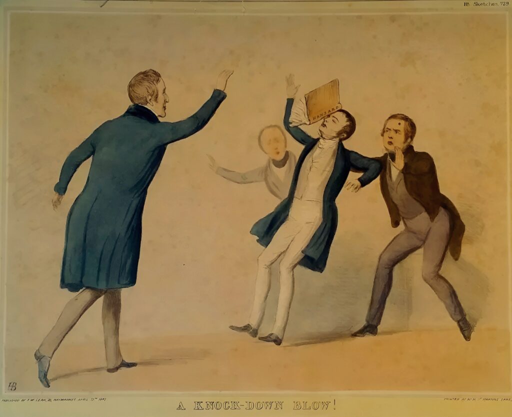 A coloured cartoon where a man in a blue coat and cream trousers throws a book called 'Hansard' into the face of another man. The man who is struck in the face is falling backwards, with two other men behind looking on and one trying to stop his fall. The caption underneath reads 'A Knock-Down Blow!'